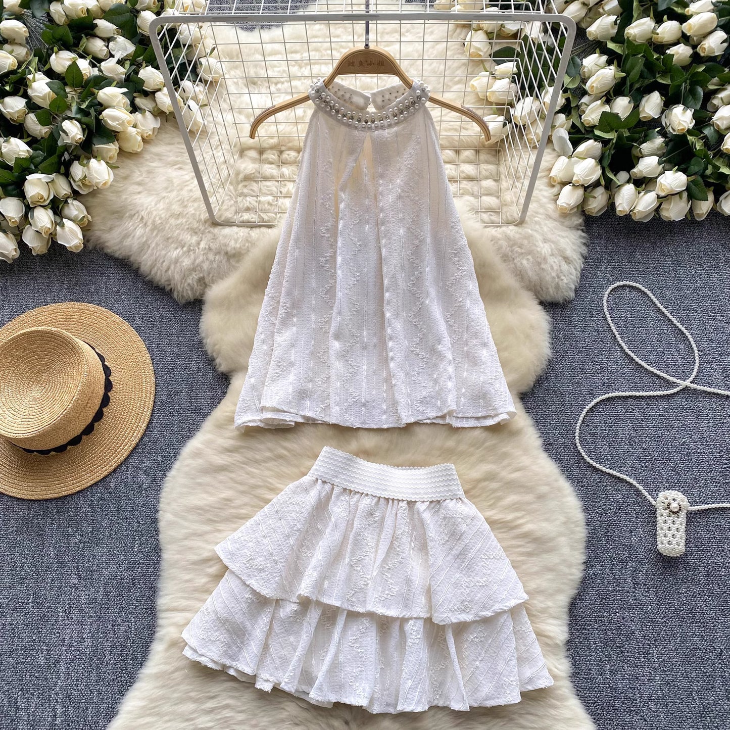 White beaded co ord set for women with sleeveless top and layered skirt by Orchid Moda