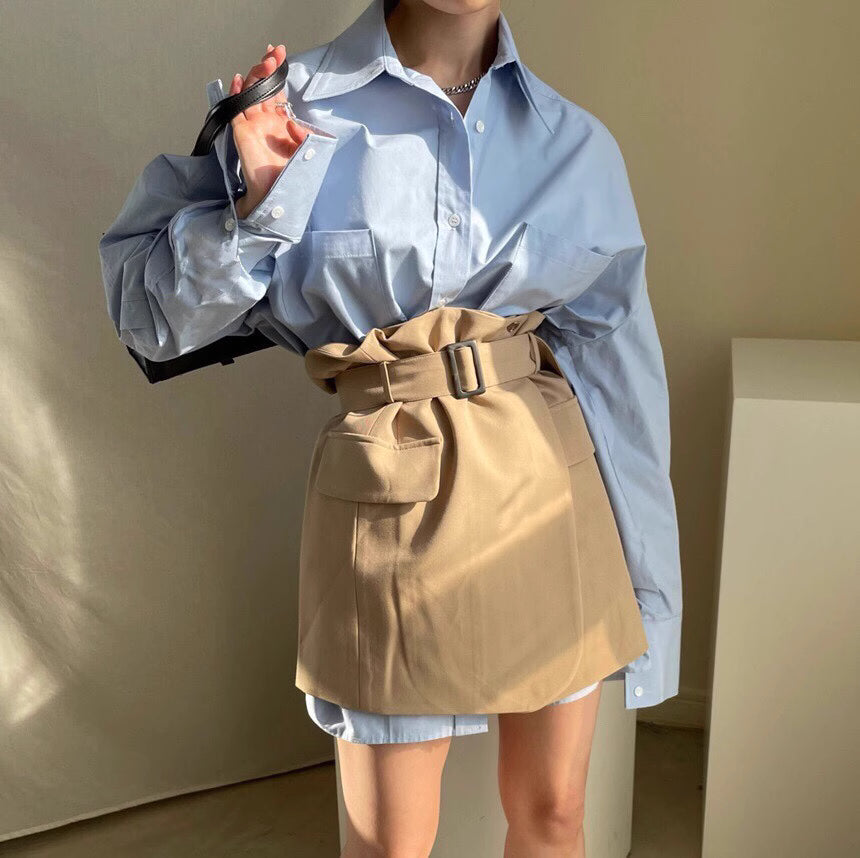 Orchid Moda closet raid oversized shirt and skirt set featuring a light blue oversized shirt with long sleeves and a beige belted mini skirt