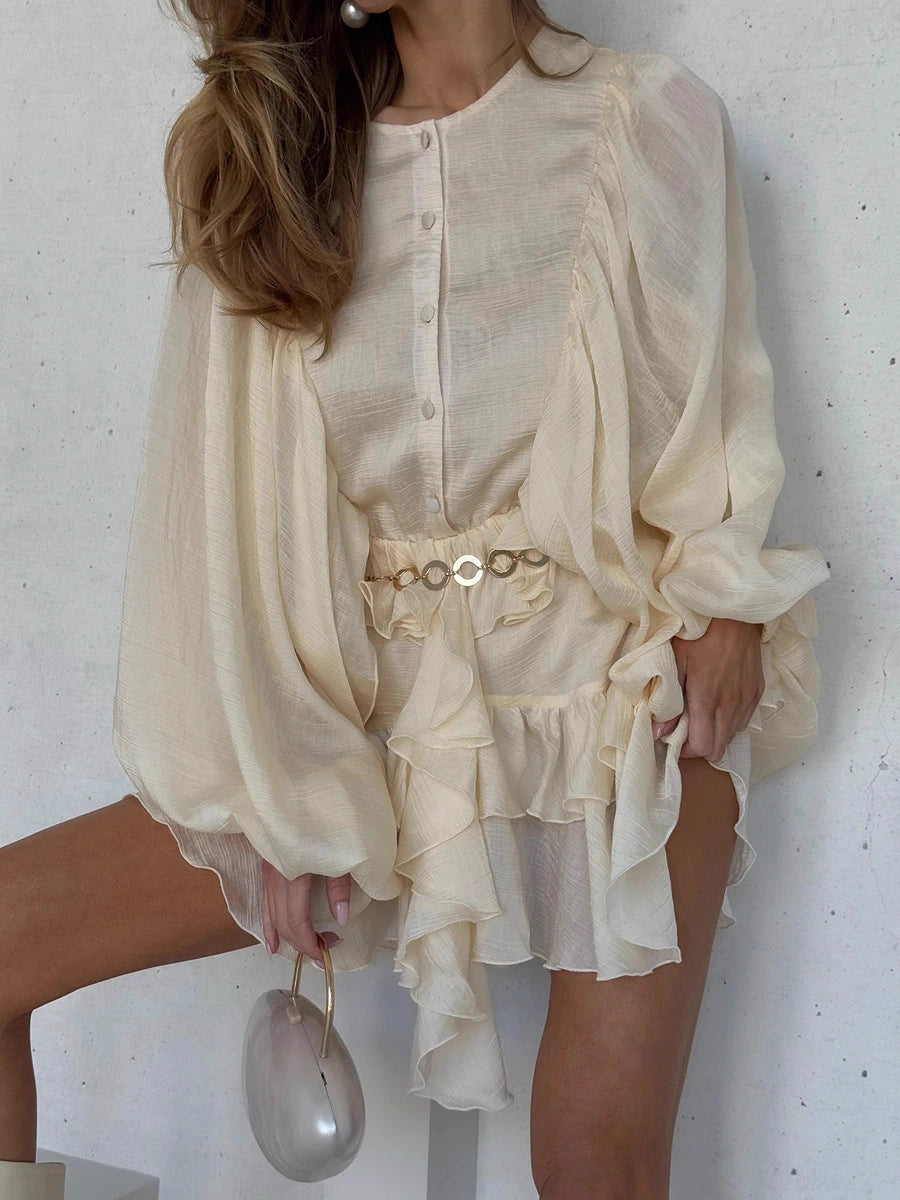 Orchid Moda beige elegant lantern sleeve dress with ruffles and gold belt detailing