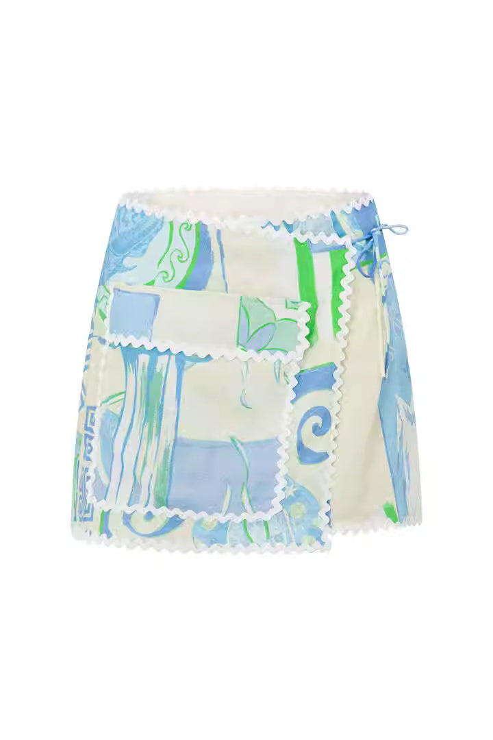 Orchid Moda printed co-ord set for women featuring blue green white abstract patterned mini skirt