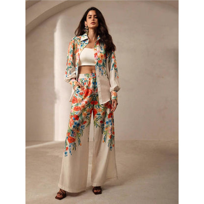 Orchid Moda womens floral co ord set with long sleeve shirt and wide leg pants in vibrant floral print