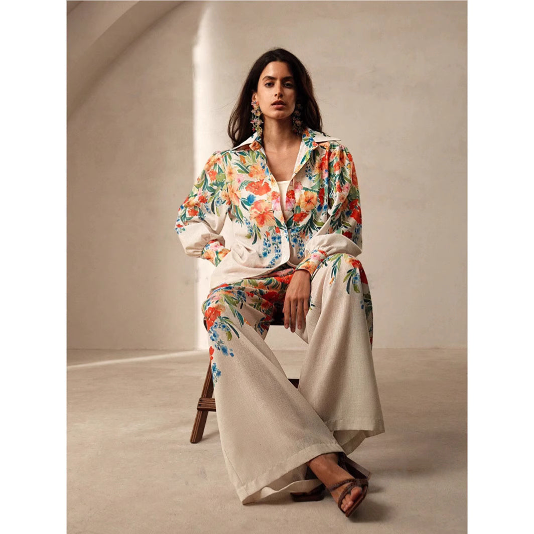 Orchid Moda womens floral co ord set featuring a colorful floral print jacket and wide-leg pants