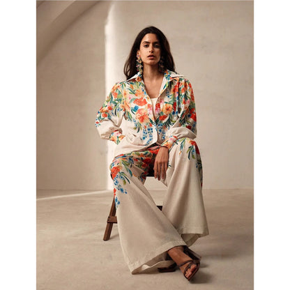 Orchid Moda womens floral co ord set featuring a colorful floral print jacket and wide-leg pants