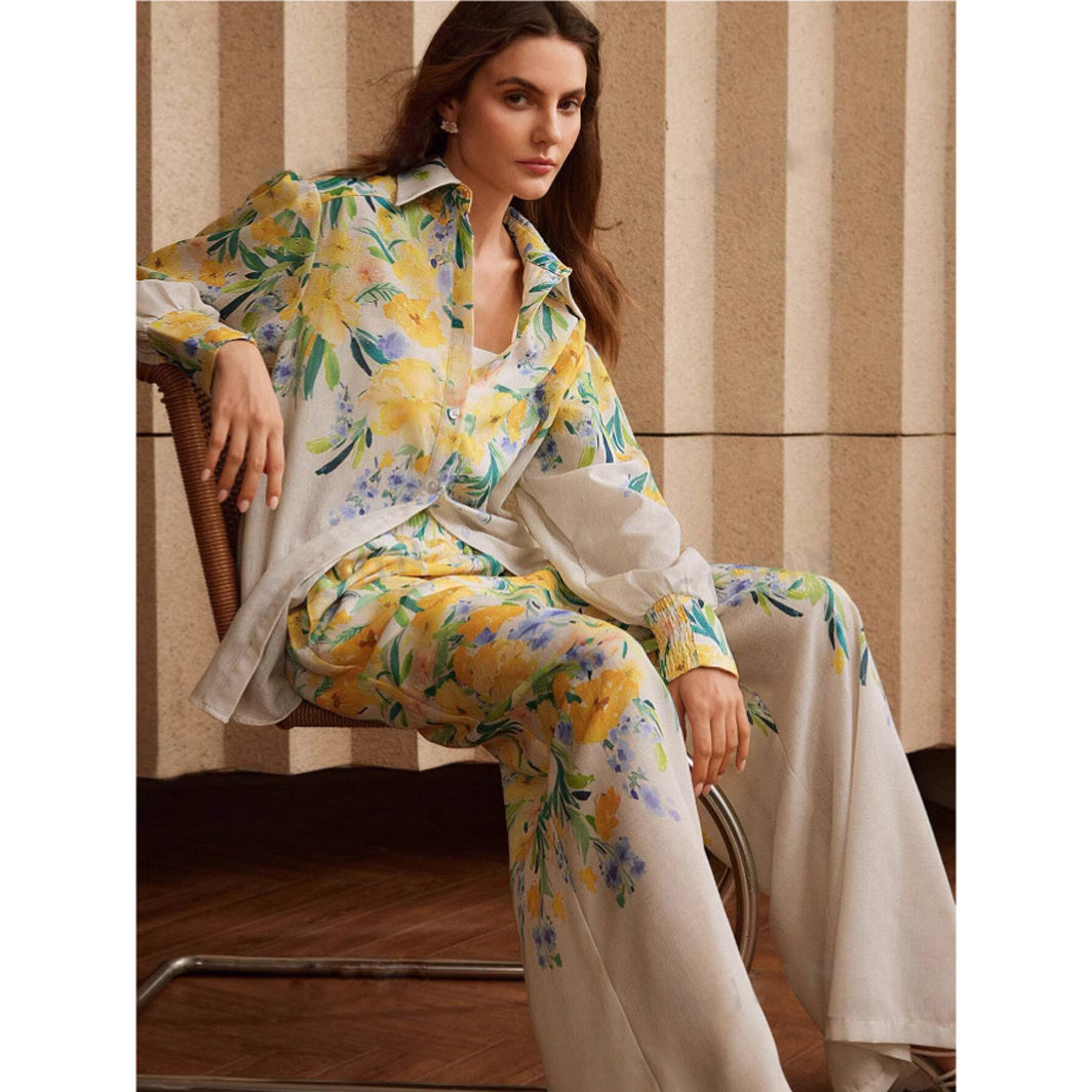 Orchid Moda womens floral co ord set with yellow and blue floral patterns on long sleeve shirt and wide leg pants